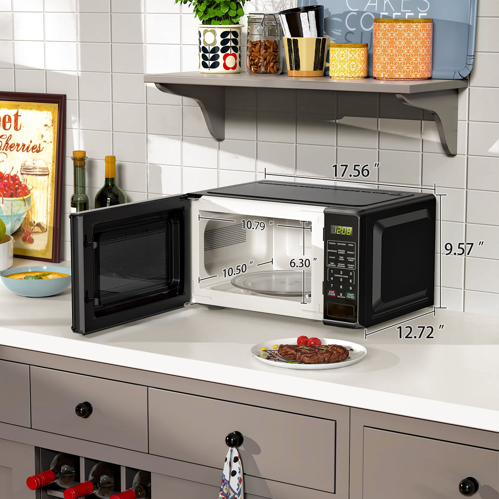 Mainstays 0.7 Cu ft Countertop Microwave Oven, 700 Watts, Black, New